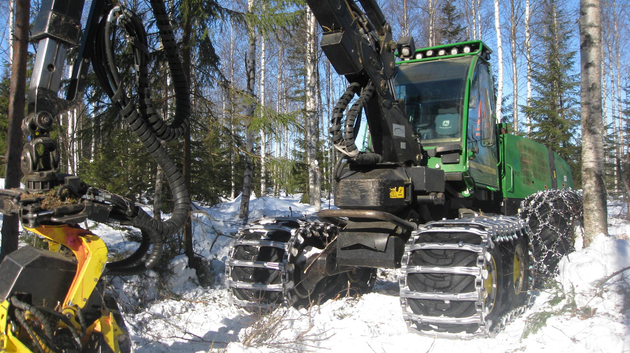 John Deere Forestry Harvester in Snow 