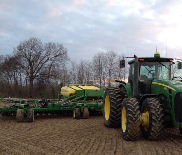 Front of John Deere 8 wheel tractor with planter 